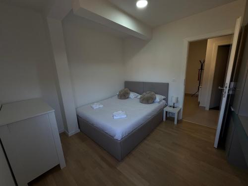 Postel nebo postele na pokoji v ubytování A&A Sarajevo