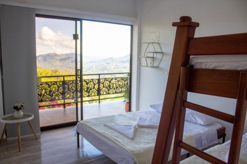 Ένα ή περισσότερα κρεβάτια σε δωμάτιο στο Hotel Curazao Natural Living