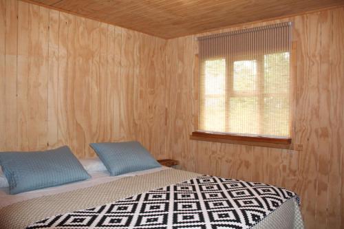 Postel nebo postele na pokoji v ubytování Doña Marta del Truful