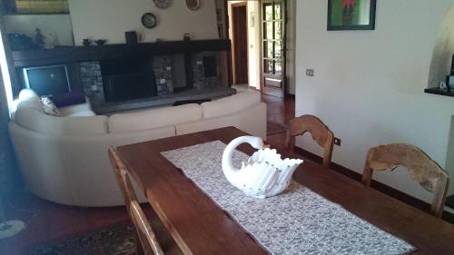 a living room with a couch and a table at Casa dei Mulini in Mergozzo