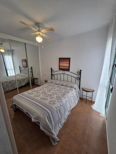 Postel nebo postele na pokoji v ubytování Atlanterra Playa 4