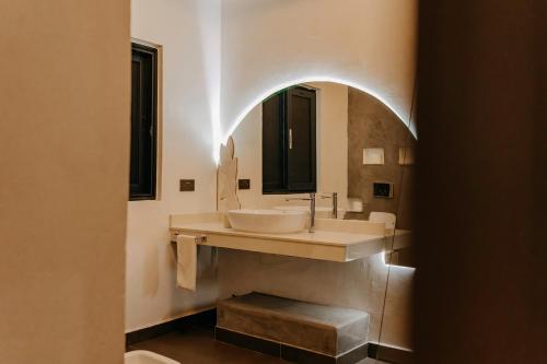 Ένα μπάνιο στο Villa con piscina uso esclusivo