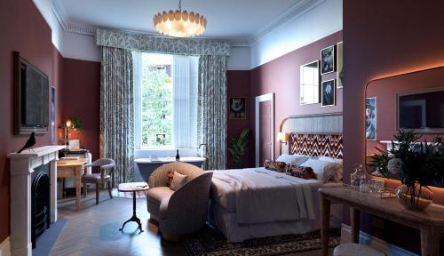 a bedroom with a bed and a chair and a desk at Bertrand's Townhouse in London