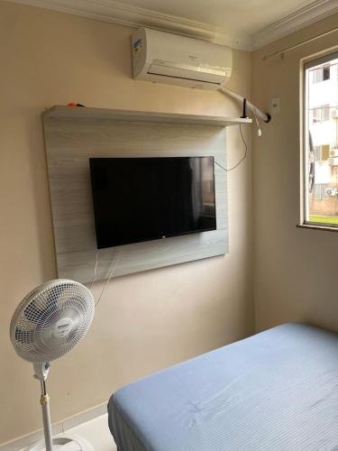 Et tv og/eller underholdning på Apartamento COP30