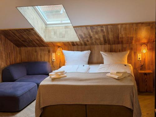 Ένα ή περισσότερα κρεβάτια σε δωμάτιο στο Aparthotel Fairschlafen Minden