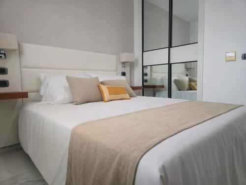 Postel nebo postele na pokoji v ubytování Infinity Homes Punta Cana