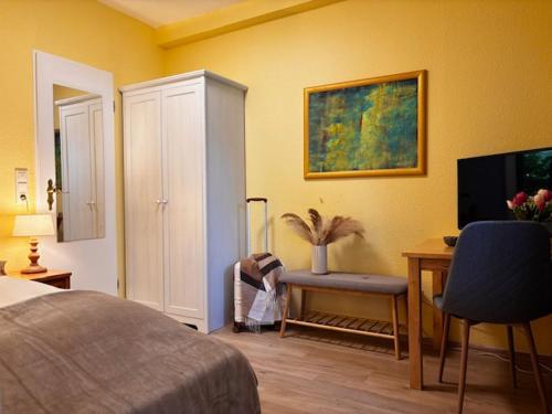 Μια τηλεόραση ή/και κέντρο ψυχαγωγίας στο Hotel Finkenhof - Haus Finkenhof