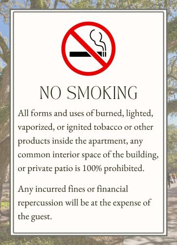 a no smoking sign in a park at USF & Busch Gardens Townhome Stay in Tampa