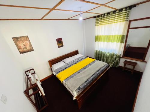 Postel nebo postele na pokoji v ubytování sasru holiday home