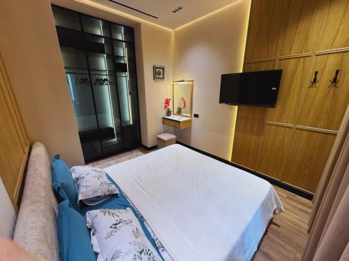 Μια τηλεόραση ή/και κέντρο ψυχαγωγίας στο NestOne - Apartment hotels