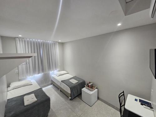 Ένα ή περισσότερα κρεβάτια σε δωμάτιο στο HOTEL POLASTRELLI