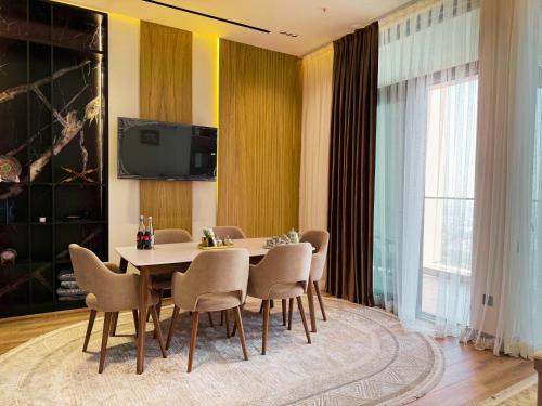 Μια τηλεόραση ή/και κέντρο ψυχαγωγίας στο NestOne - Apartment hotels