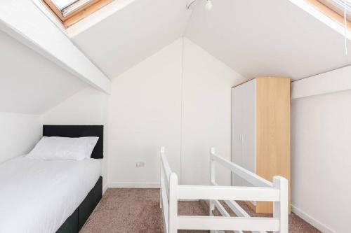 Ένα ή περισσότερα κρεβάτια σε δωμάτιο στο Burley Guest House