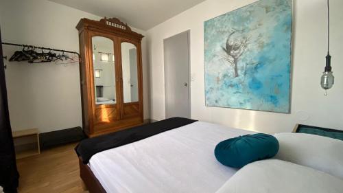 Postel nebo postele na pokoji v ubytování Mon p'tit nid