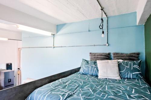 En eller flere senge i et værelse på 101 Revolution, Maboneng, FREE WIFI, FREE PARKING