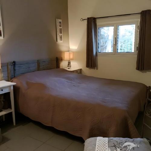 Postel nebo postele na pokoji v ubytování Centre Luberon, cabanon Hématite