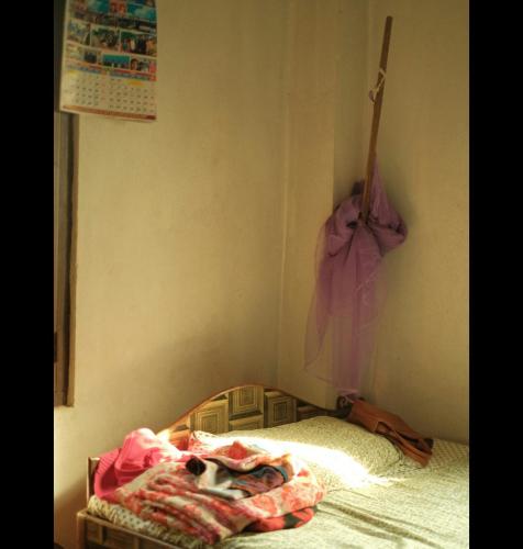 Postel nebo postele na pokoji v ubytování Murali Manohar homestay