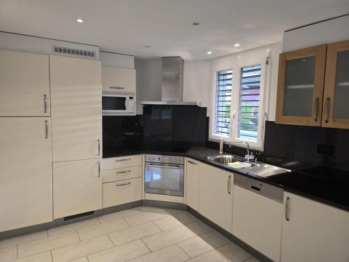 Η κουζίνα ή μικρή κουζίνα στο Comfort Stay