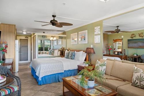 a living room with a bed and a couch at Napili Bay 210 · NB 210 Napili Bay Studio with Direct Ocean View in Kahana