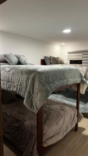 Ένα ή περισσότερα κρεβάτια σε δωμάτιο στο Casa Grande