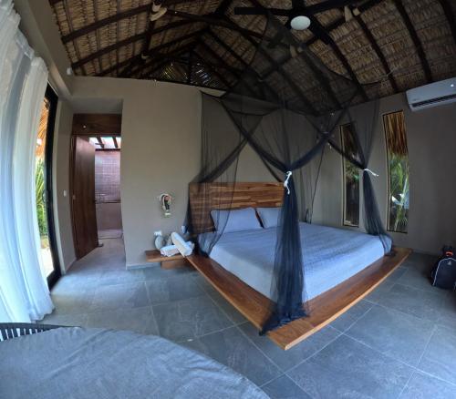 Postel nebo postele na pokoji v ubytování Casa A'more