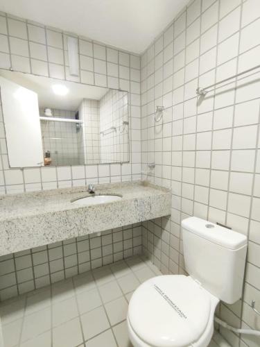 Ένα μπάνιο στο Flat Bellagio - BEIRA MAR - com localização super privilegiada!