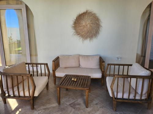 Istumisnurk majutusasutuses villa avec piscine style bohème