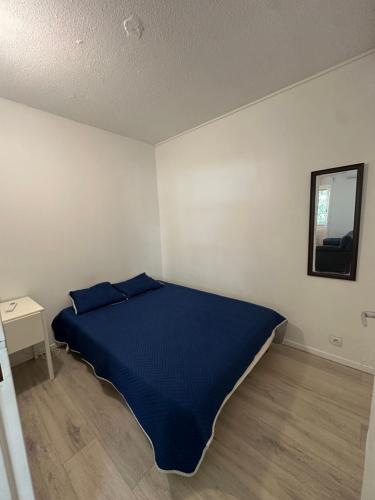 Rúm í herbergi á L'escale Bain Bleu
