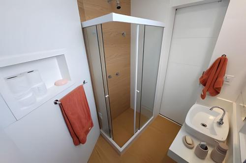 a bathroom with a shower and a sink at Mario401| Loft in Leblon next do Lagoa in Rio de Janeiro