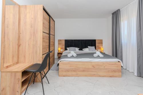 Postel nebo postele na pokoji v ubytování Villa Dalmatia, new modern villa with swimming pool near Zadar