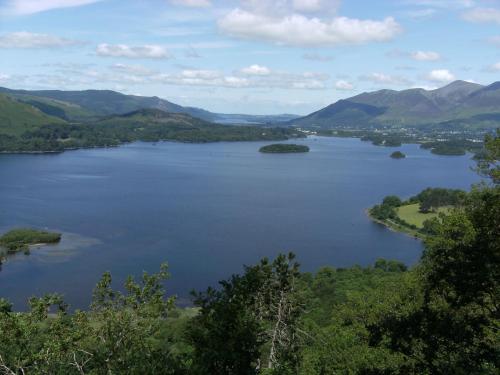 a view of a lake in the mountains at Glen Wynne Windermere - FREE off-site Health Club access with Pool, Sauna, Steam Room & Gym Short 5 Minute Drive Away in Windermere