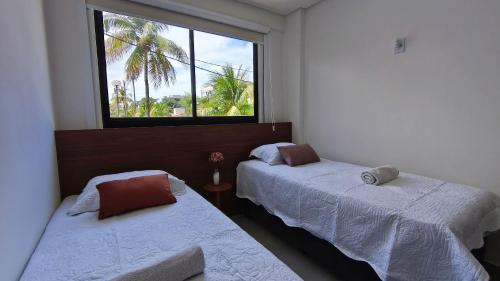 Voodi või voodid majutusasutuse Tours Du Porto by CTA - Centro Porto de Galinhas toas