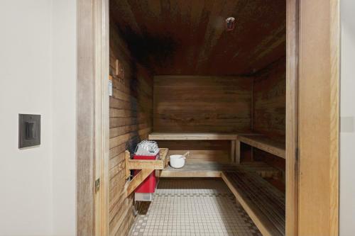 a small wooden sauna with a table in it at Powderhorn Lodge 214 Perfect Solitude Escape in Solitude
