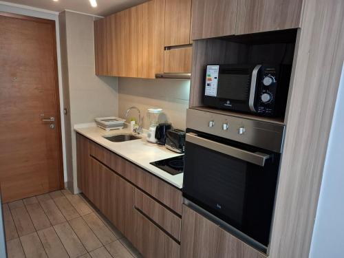 Köök või kööginurk majutusasutuses Depto cálido con estilo y excelente ubicación