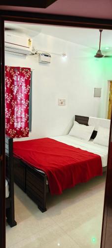 Postel nebo postele na pokoji v ubytování KN Royal Residency