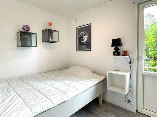 Ένα ή περισσότερα κρεβάτια σε δωμάτιο στο Archipelago Villa with Pool & Patio