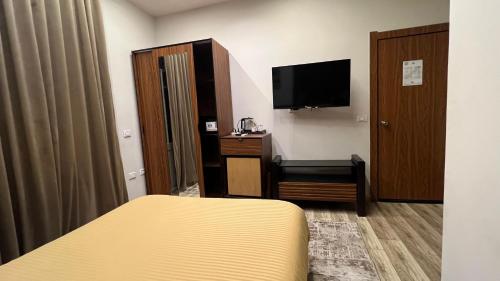 Cairo Excellent Location hotelにあるテレビまたはエンターテインメントセンター