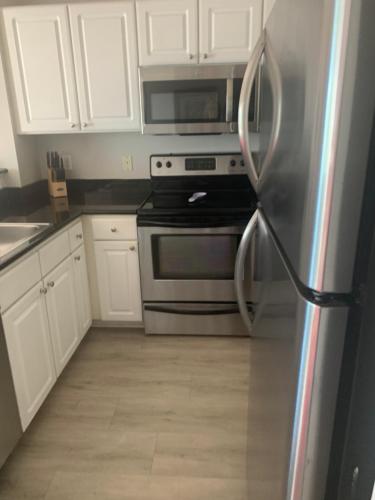 Kuchyň nebo kuchyňský kout v ubytování Madeira Bay Resort