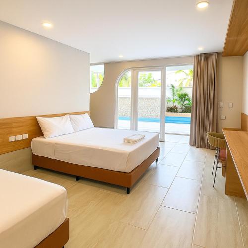 Ένα ή περισσότερα κρεβάτια σε δωμάτιο στο Stanza Del Mar