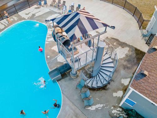 an overhead view of a water slide at a water park at Ingallview at Branson Cove Indoor Pool in Hollister