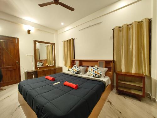 Ένα ή περισσότερα κρεβάτια σε δωμάτιο στο Shalom Luxurious 3 Bedroom AC Villa 65" TV