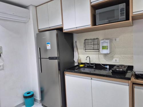 Kuchyň nebo kuchyňský kout v ubytování Apto ao lado do metrô de SP