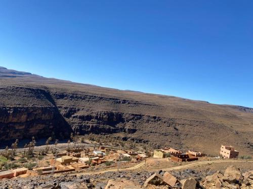 a village on the side of a mountain at Gite d'tape handour in Hamdour