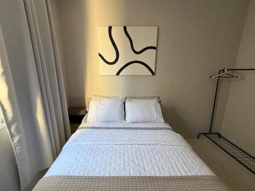 Postel nebo postele na pokoji v ubytování Seu lar perfeito fora de casa Prox ao Shopping Iguatemi