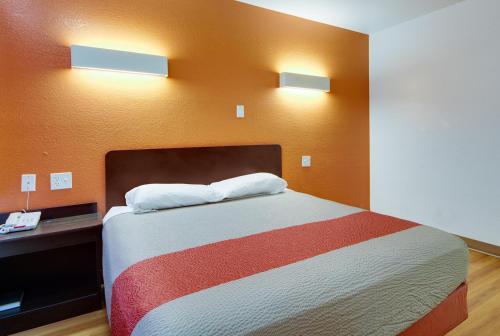 Ένα ή περισσότερα κρεβάτια σε δωμάτιο στο Avera Suites