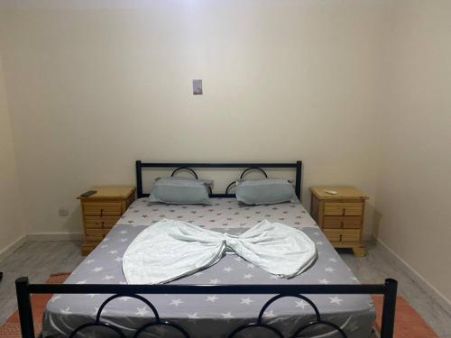 Postel nebo postele na pokoji v ubytování Djerba Sérénité ⵣ