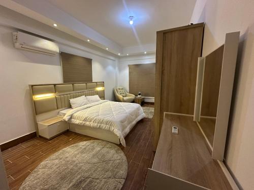 Ένα ή περισσότερα κρεβάτια σε δωμάτιο στο White Greece villa