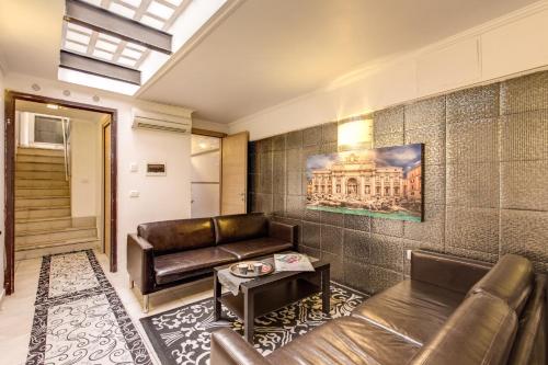 Гостиная зона в Aurelia Vatican Apartments