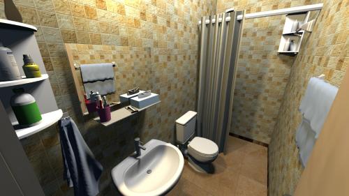 にあるOrt des Entstehensの洗面台とトイレ付きのバスルーム