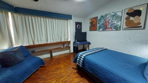 Postel nebo postele na pokoji v ubytování Habitación amplia cerca de Andares